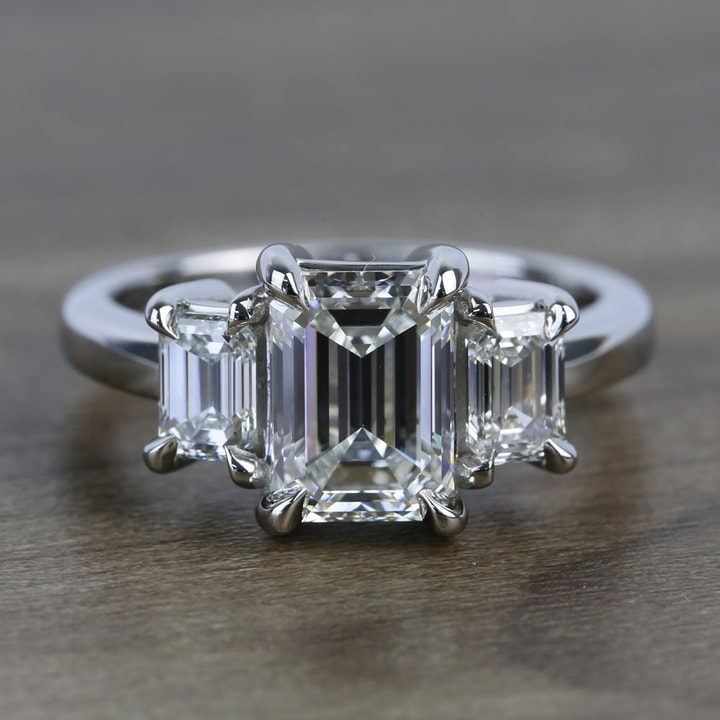 3 stone emerald cut engagement rings