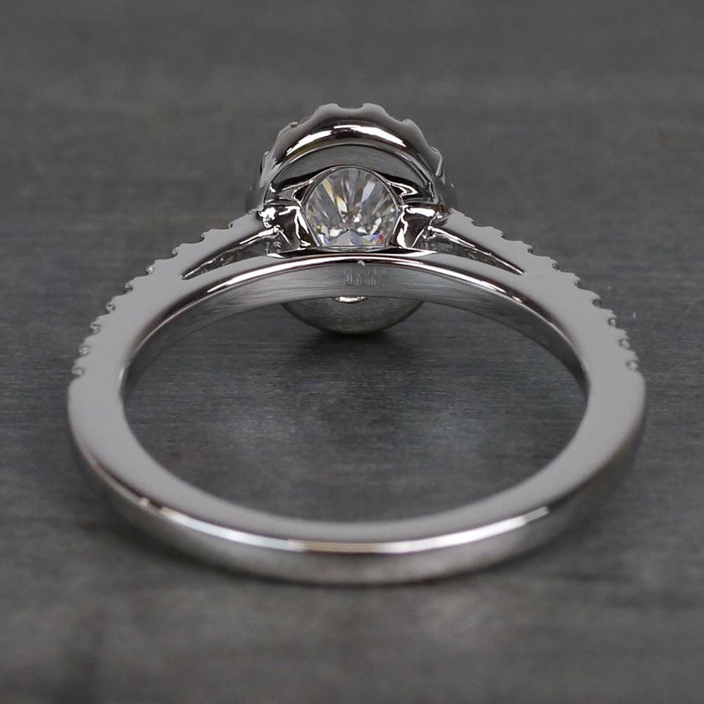 Oval Cut Halo Engagement Ring With Diamond Band