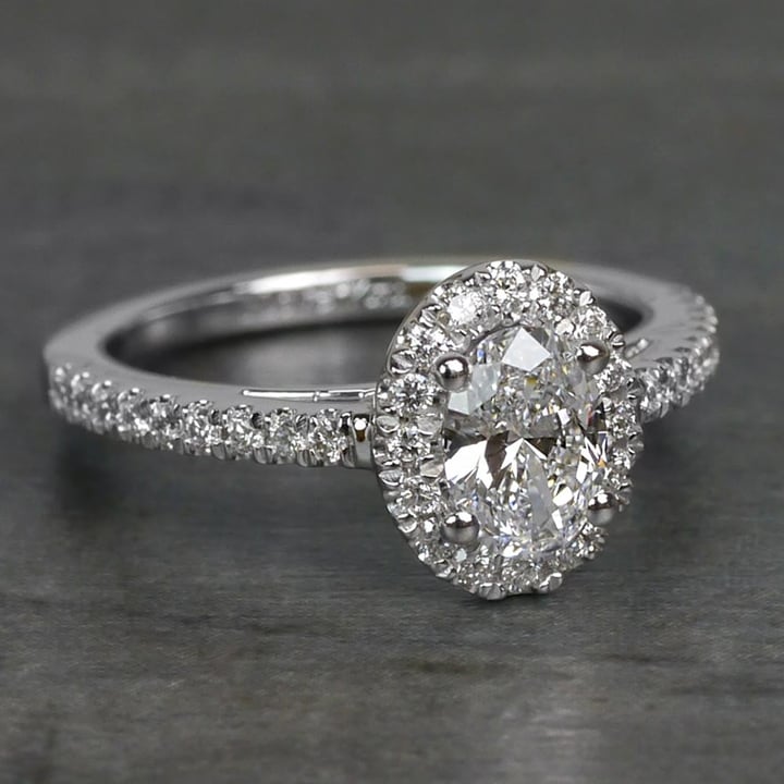 Oval Cut Halo Engagement Ring With Diamond Band