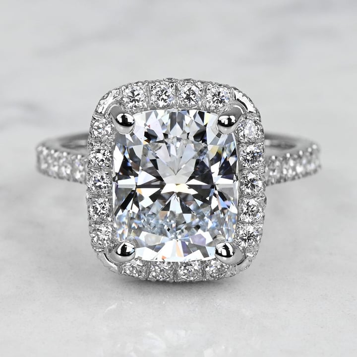 https://www.brilliance.com/cdn-cgi/image/width=720,height=720,quality=85/sites/default/files/recently-purchased-rings/custom-4-carat-lab-created-cushion-diamond-halo-engagement-ring/328338-4ct-cushion-custom-halo-er-1.jpg