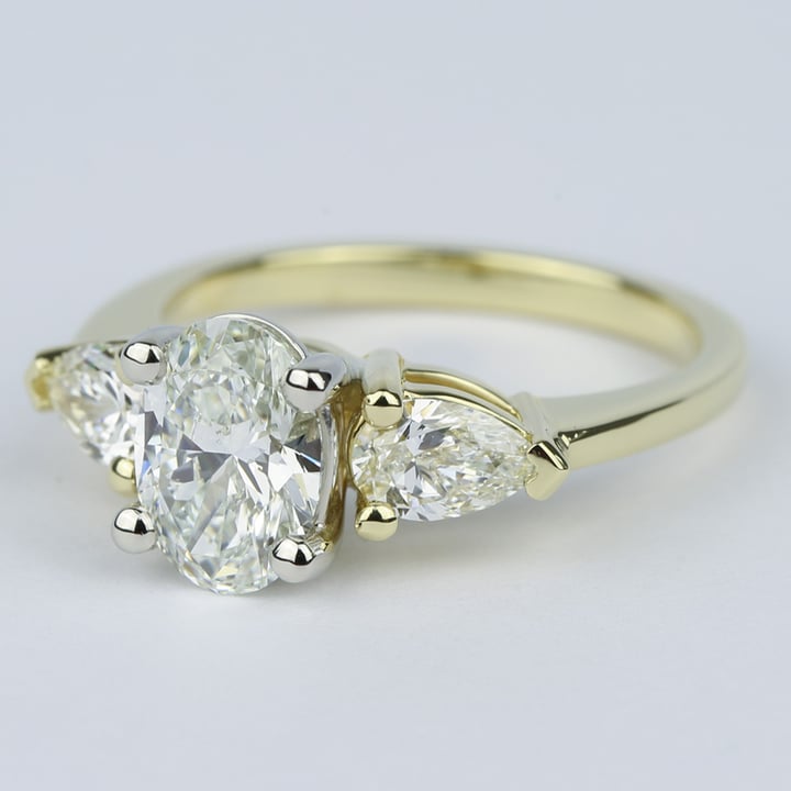1.5 Ct Oval Diamond Engagement Ring With Pear Diamonds