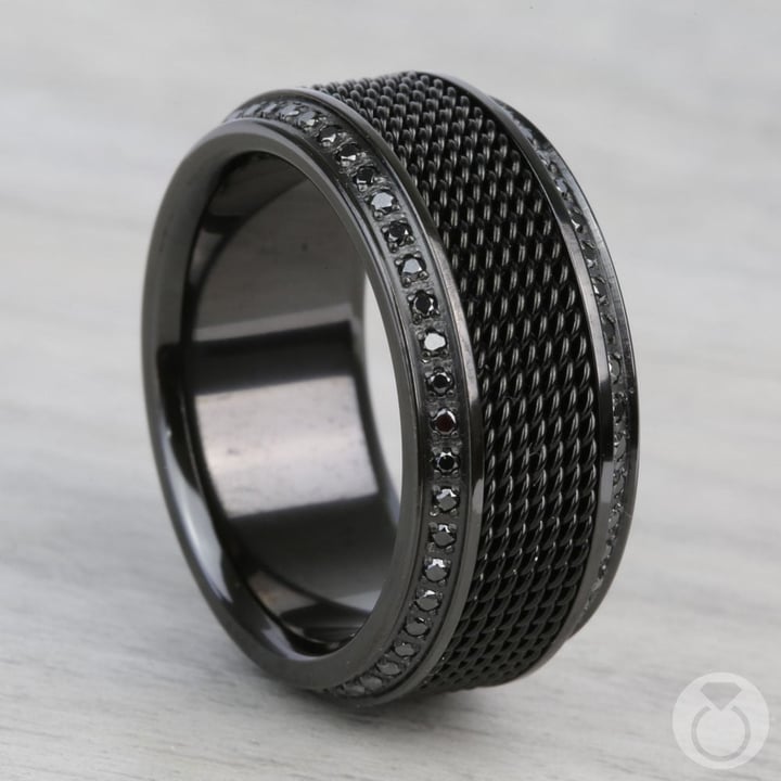 https://www.brilliance.com/cdn-cgi/image/width=720,height=720,quality=85/sites/default/files/rings/kingpin-black-titanium-steel-chainmail-inlay/kingpin-black-diamond-mens-wedding-ring-5.jpg