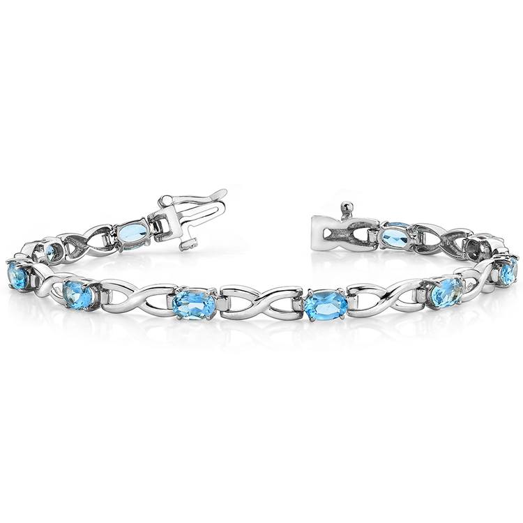 Twisted Swiss Blue Topaz Oval-Cut Gem Bracelet In White Gold (5 Ctw)