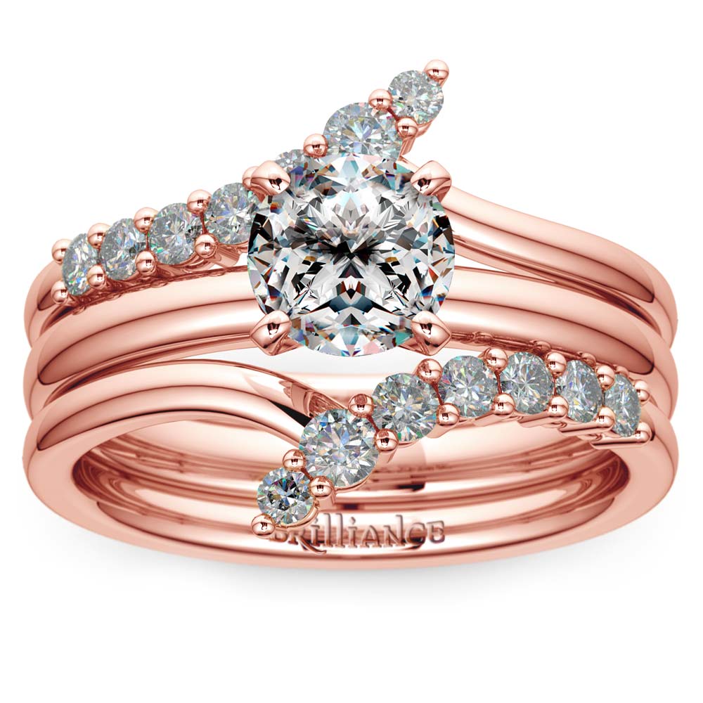 Asymmetric ring with a diamond in pink gold