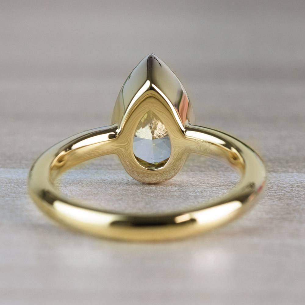 1.25 Carat Fancy Yellow Pear Diamond Bezel Solitaire Engagement Ring