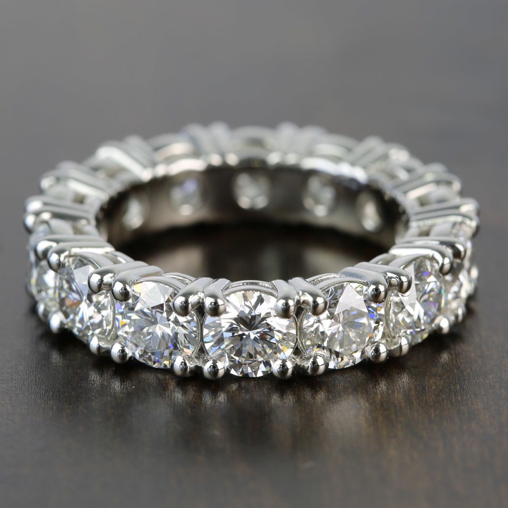 round diamond with diamonds on band