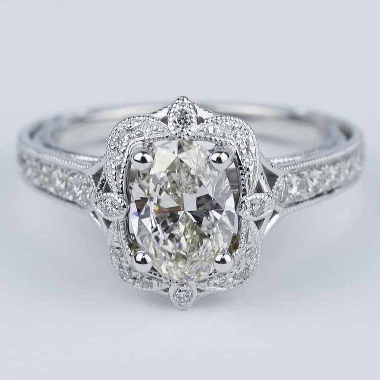 Antique Halo Designer Engagement Ring with Oval Diamond