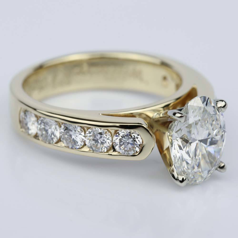 Oval Channel Set Diamond Engagement Ring In Yellow Gold