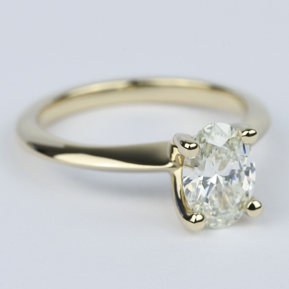 1 Carat Oval Diamond Set In Knife-Edge Engagement Ring