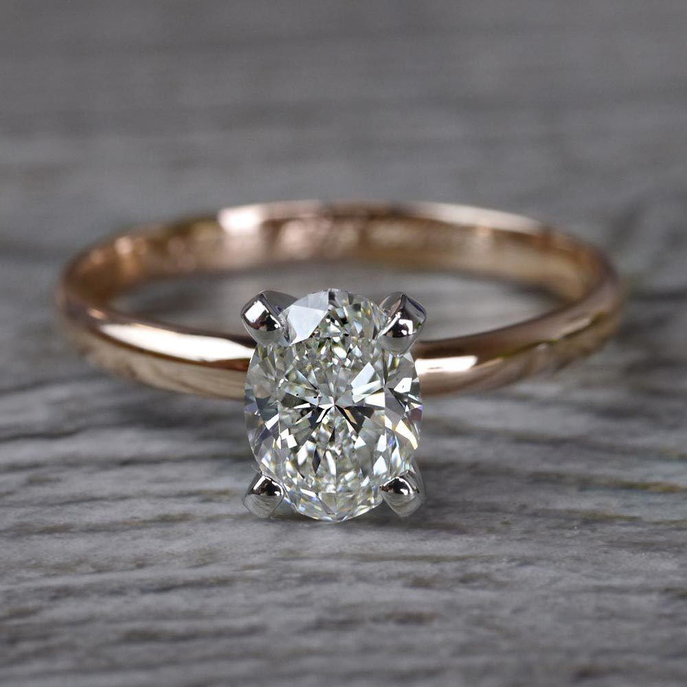 rose gold solitaire oval diamond ring