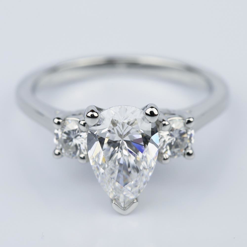 Three Stone Pear Shaped Diamond Ring In Platinum