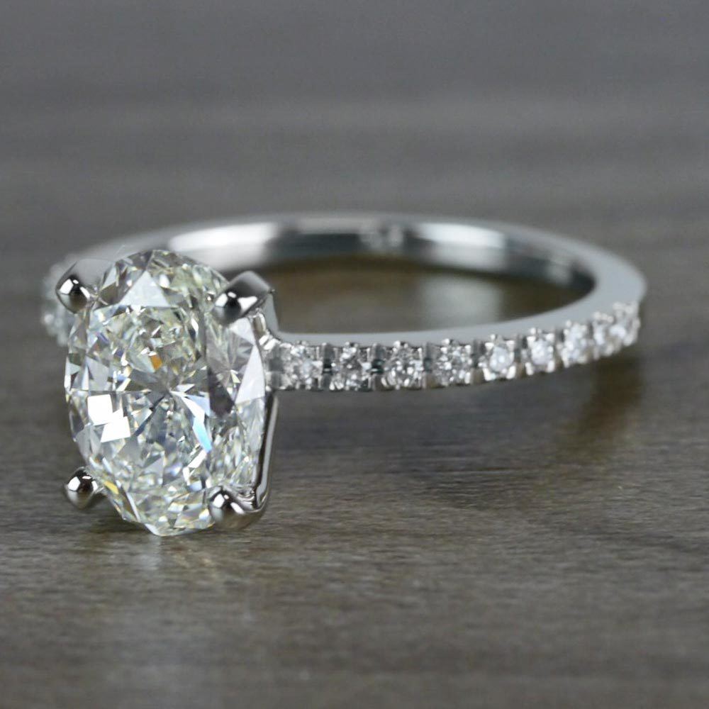 Whimsical White Gold Engagement Oval Diamond Ring