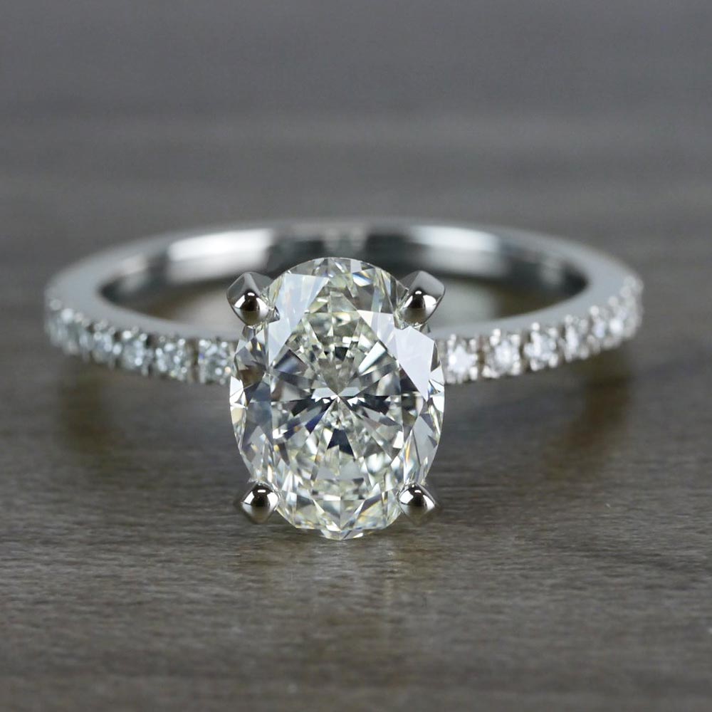 Whimsical White Gold Engagement Oval Diamond Ring